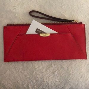 New, never used HENRI BENDEL clutch.
